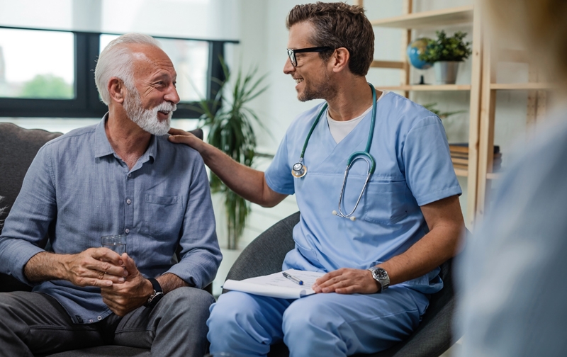 Home Health nurse talking with patient 